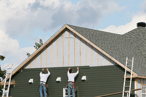 Professional Siding Contractor technician working in Medina, TX